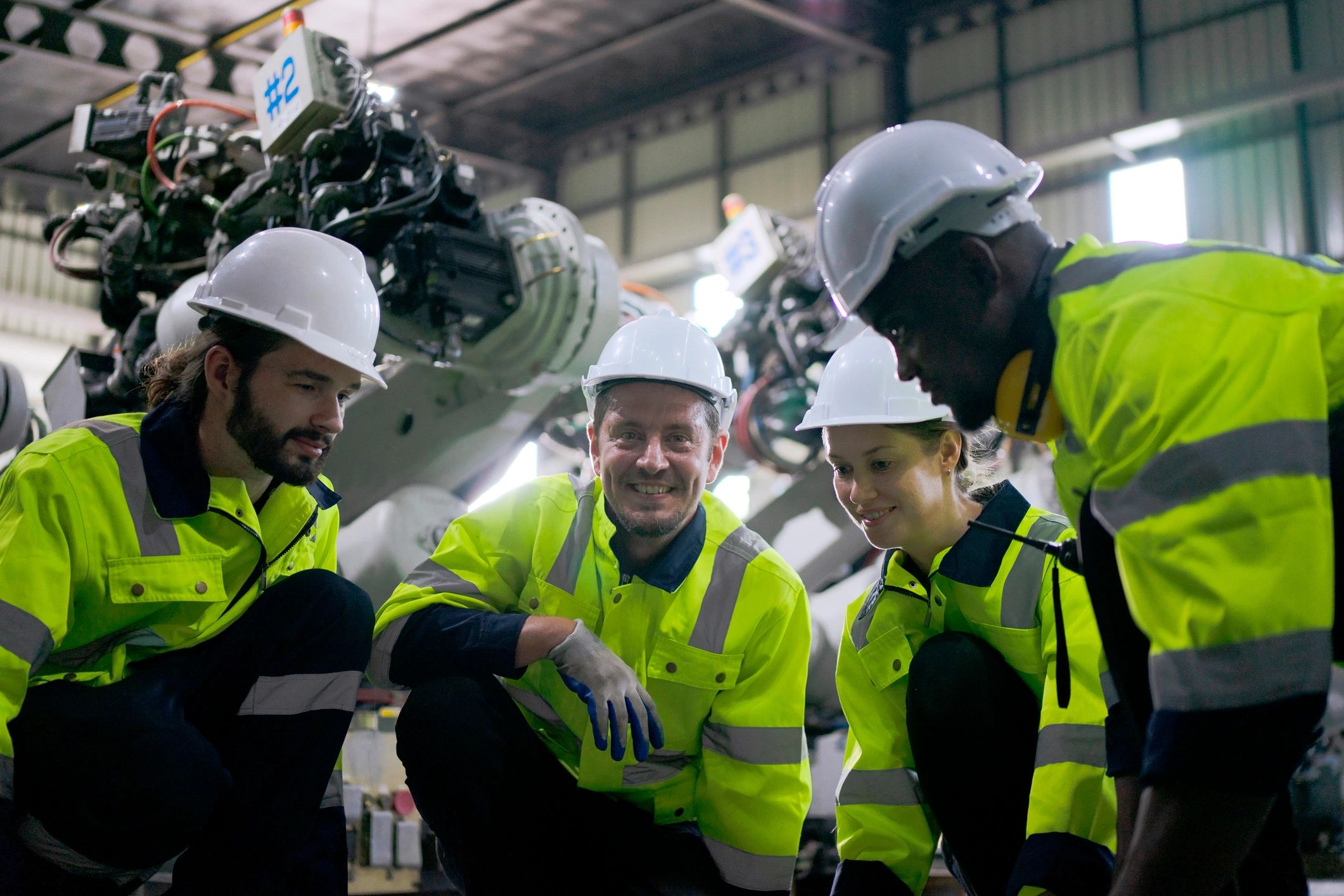 Engineer reviewing operations data in an industrial setting